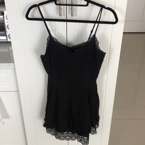 Forever 21, Woman’s size Medium, black dress, lace like embellishment